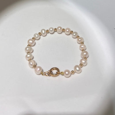 Collier en perles d’eau et Or